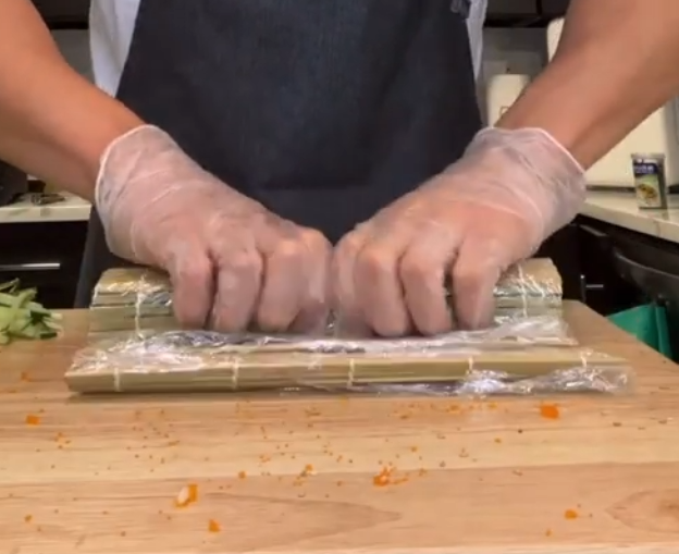 Rolling the sushi