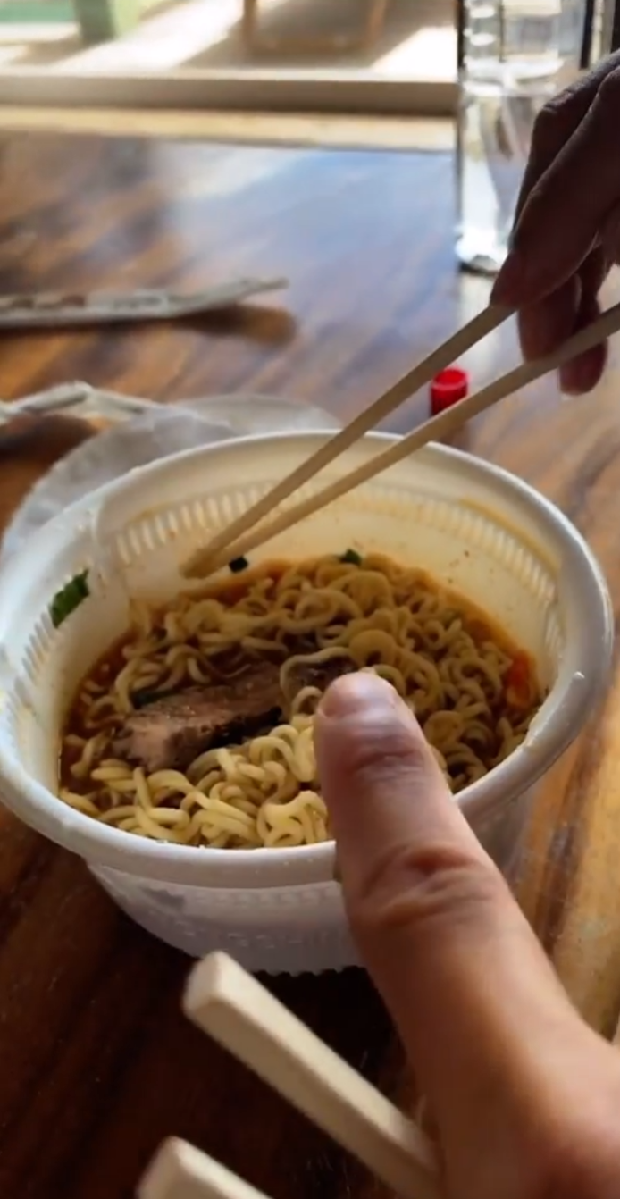 Adding meat to the ramen