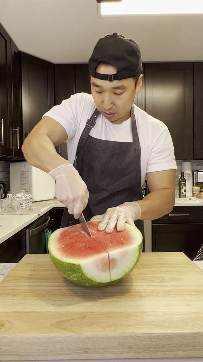 Cut the watermelon in quarters