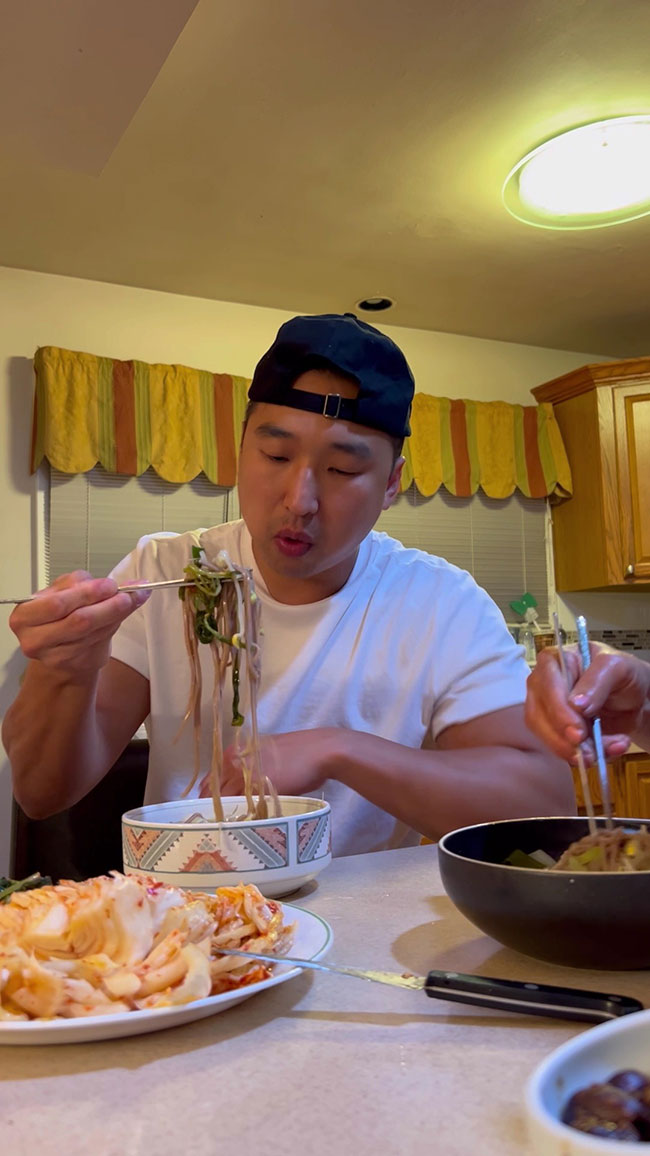 Chef Chris Cho enjoying acorn noodle soup