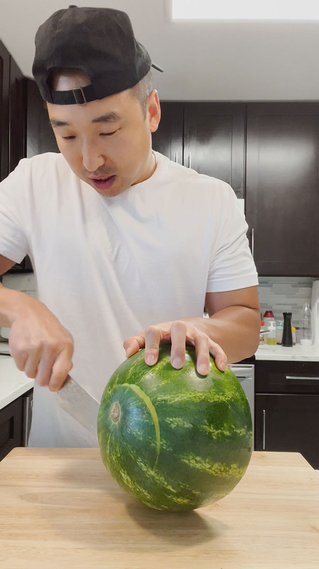 Cut the top and bottom of the watermelon 