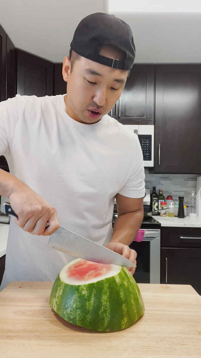 Cut watermelon in half