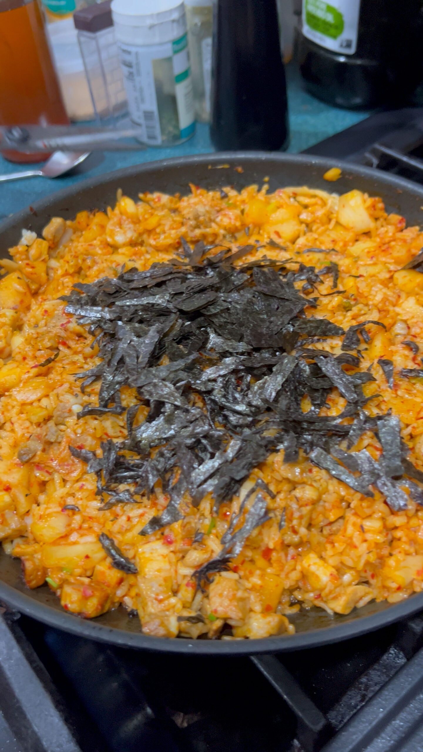 Garnish kimchi fried rice with nori 