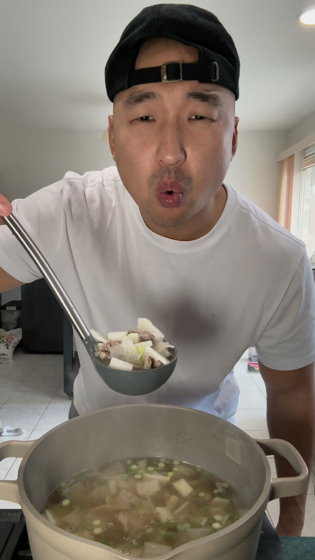 Chef Chris Cho making Beef and Radish Soup