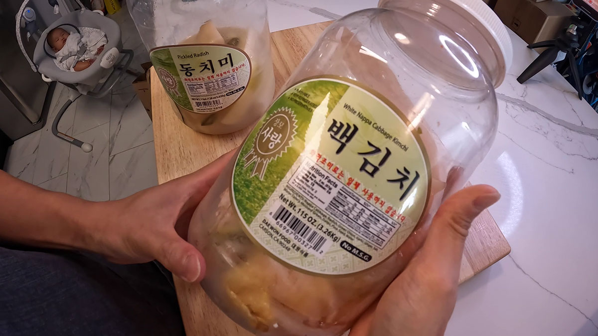 A jar of white nappa cabbage kimchi