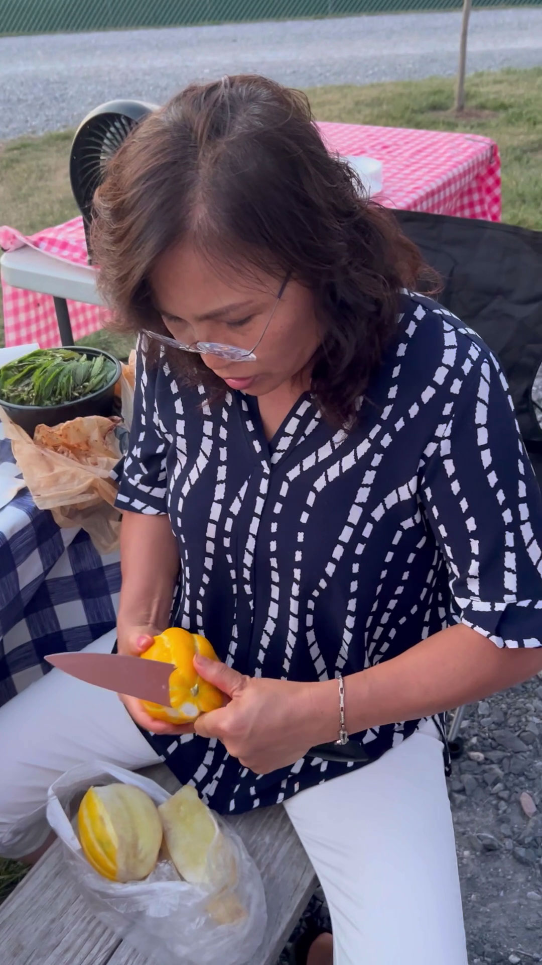 Mama Cho peeling a Korean melon