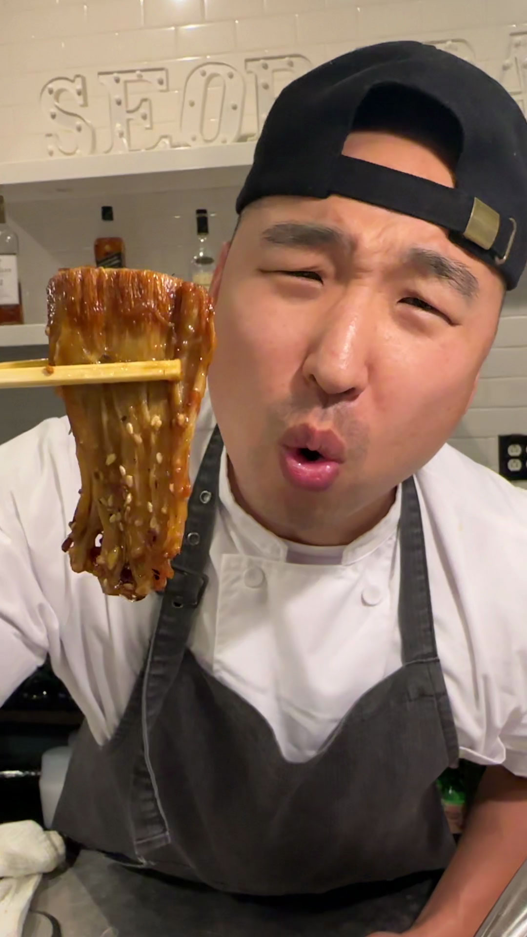 Chef Chris Cho making Soy Garlic Enoki Mushroom 