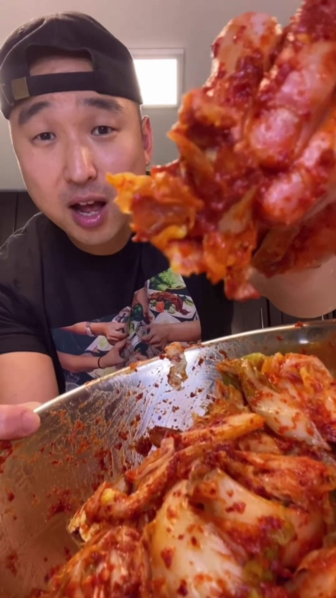 Chef Chris Cho giving readers kimchi 