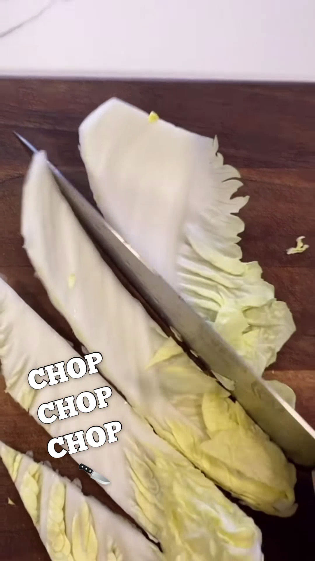 Chopping napa cabbage diagonally 