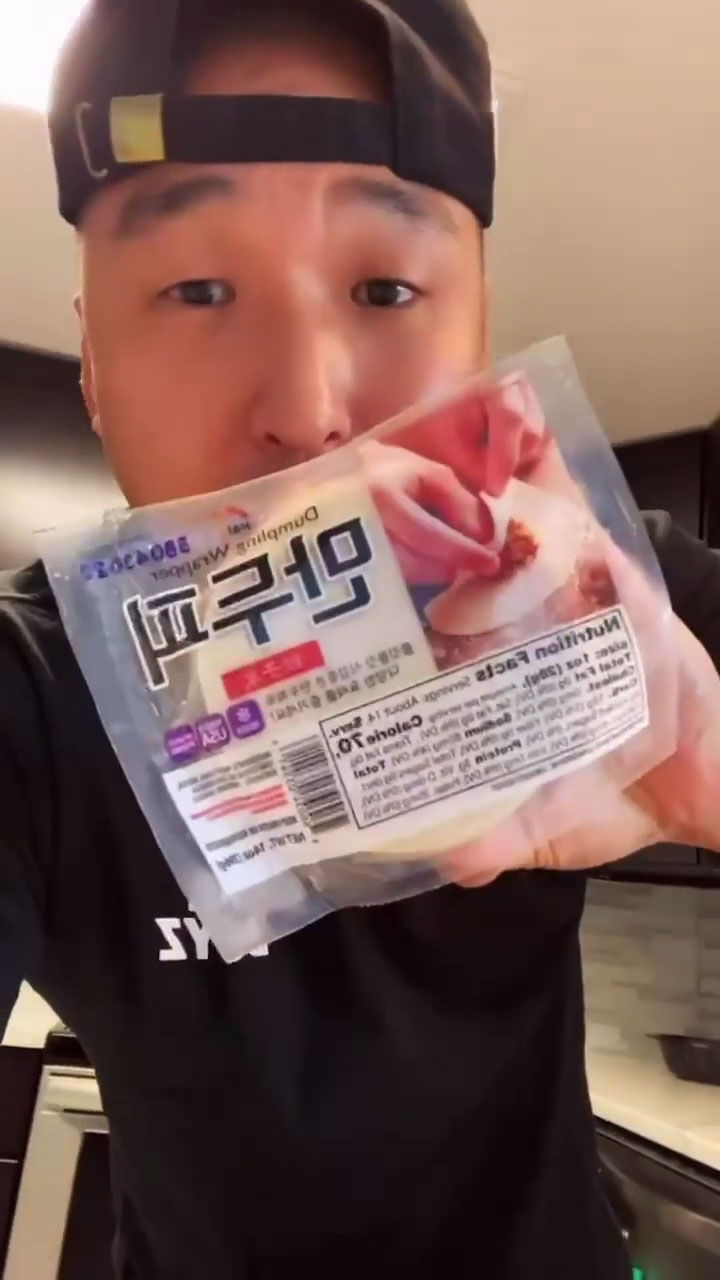 Chef Chris Cho showing store-bought dumpling skin 