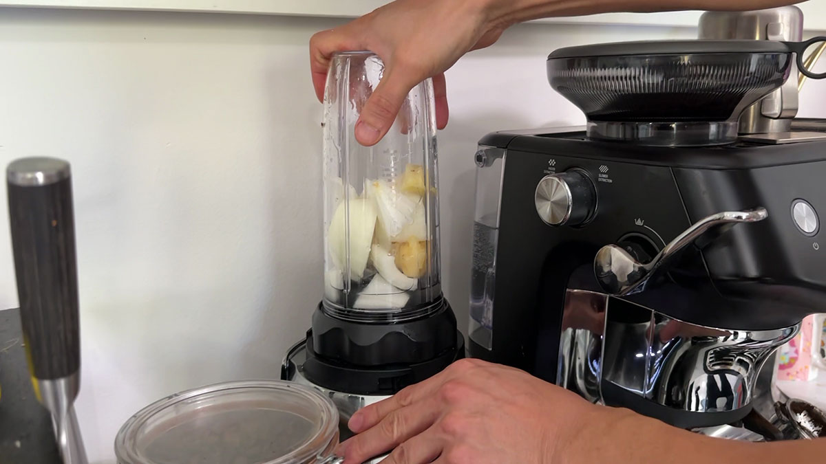 Blending garlic, onion, ginger, and Korean pear