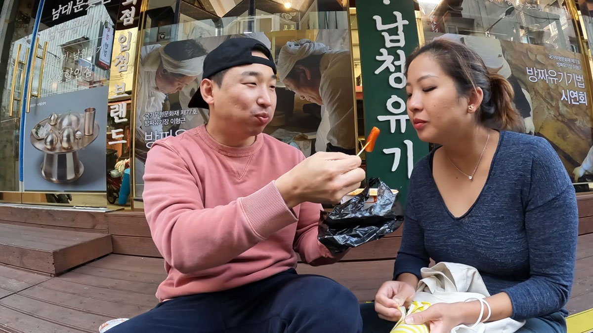 Chef Chris Choand his wife enjoying Korean food 