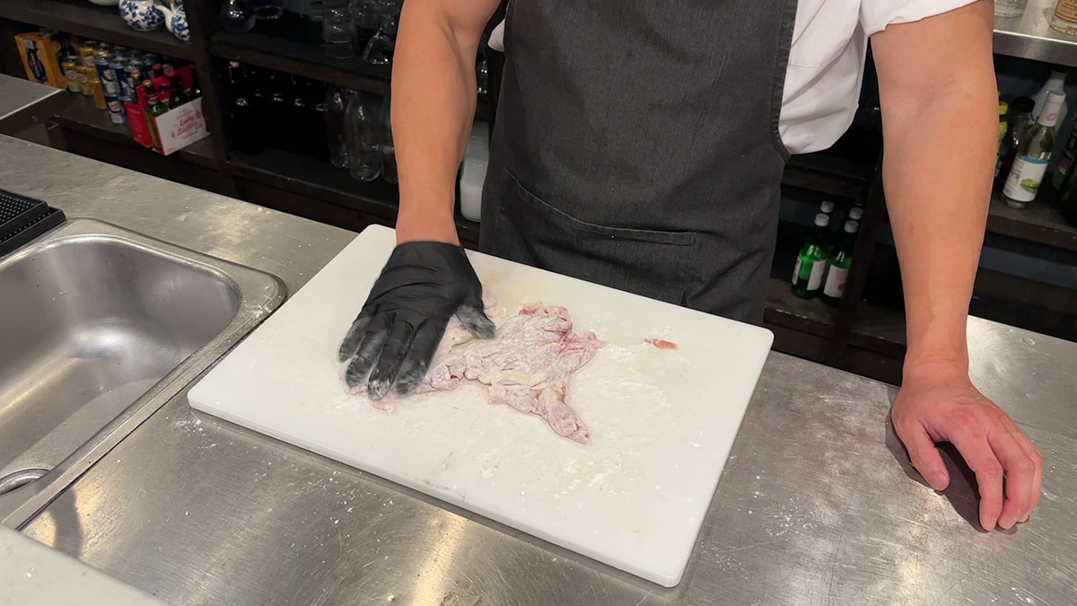 Lightly coat the chicken with potato starch 