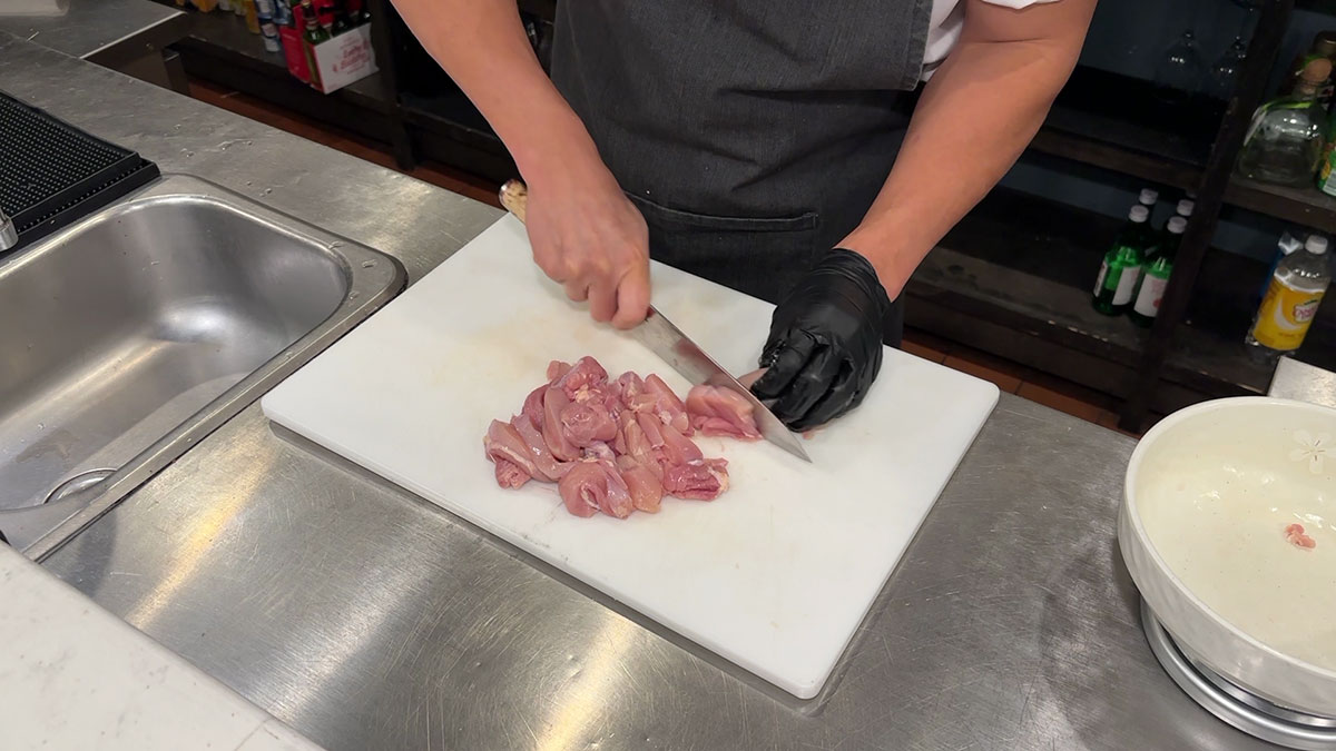 Slice the chicken into bitesize pieces
