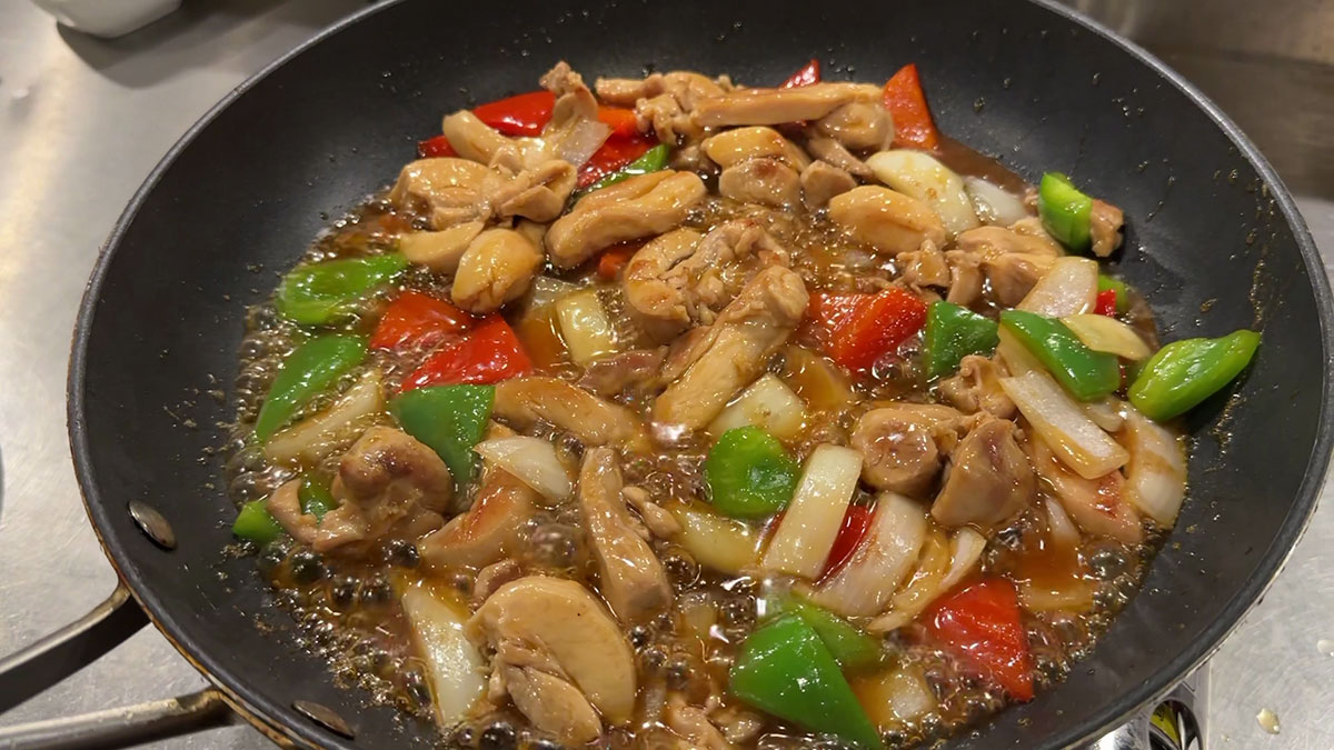 Coat the chicken and veggies with teriyaki sauce 