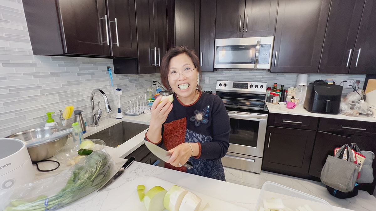 Mama Cho enjoying radish