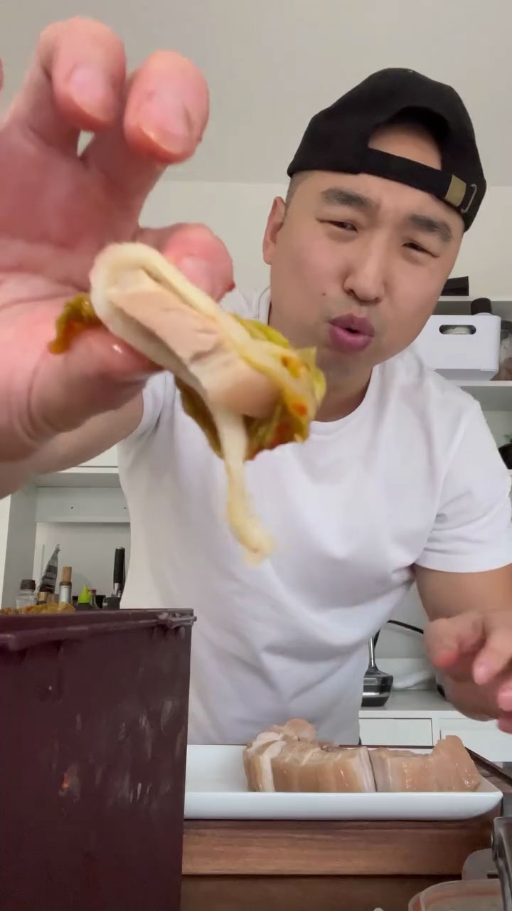 Chef Chris Cho making bossam