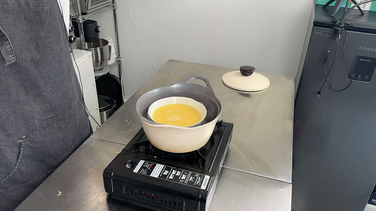 Makeshift steamer using a deep pot to steam eggs