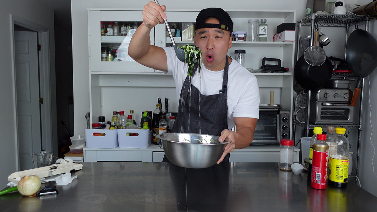Chef Chris Cho making Oi Naengguk 