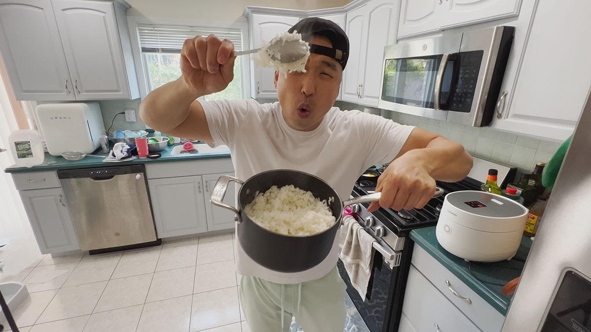 Chef Chris Cho making rice in the stove