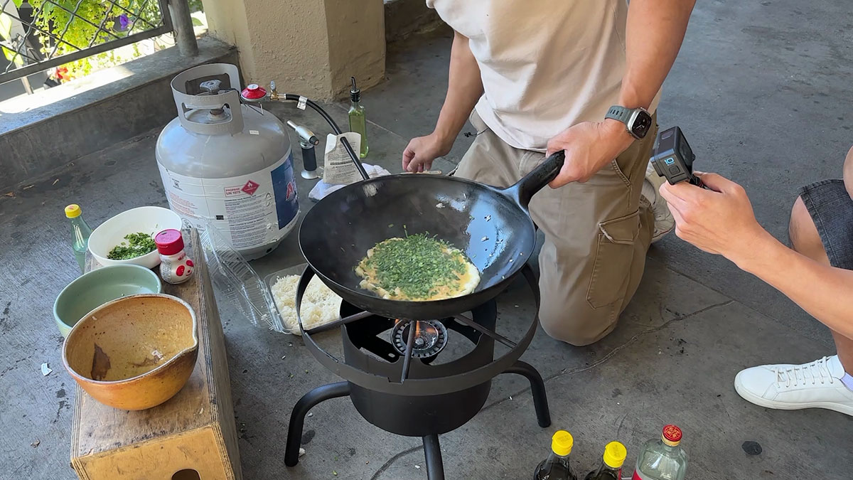 Cooking eggs and chives