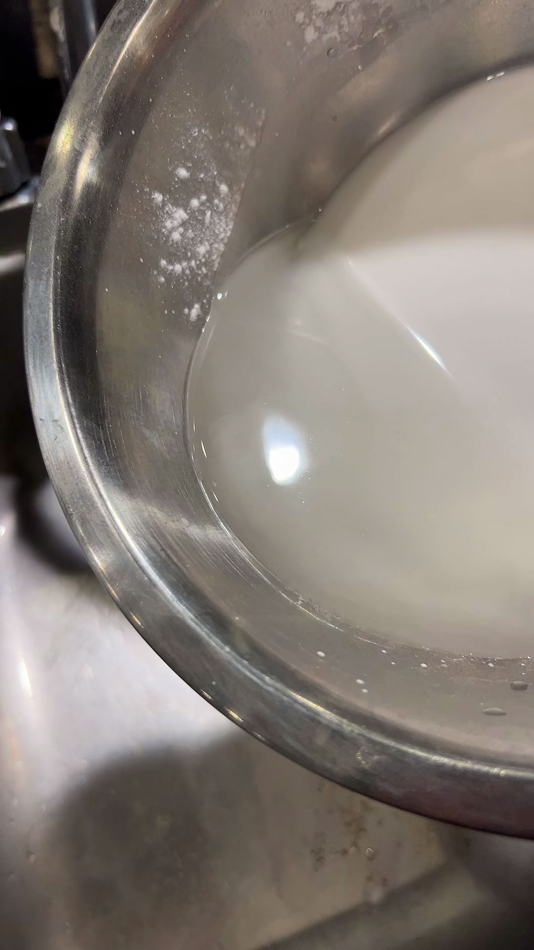 Removing excess water from potato starch batter 