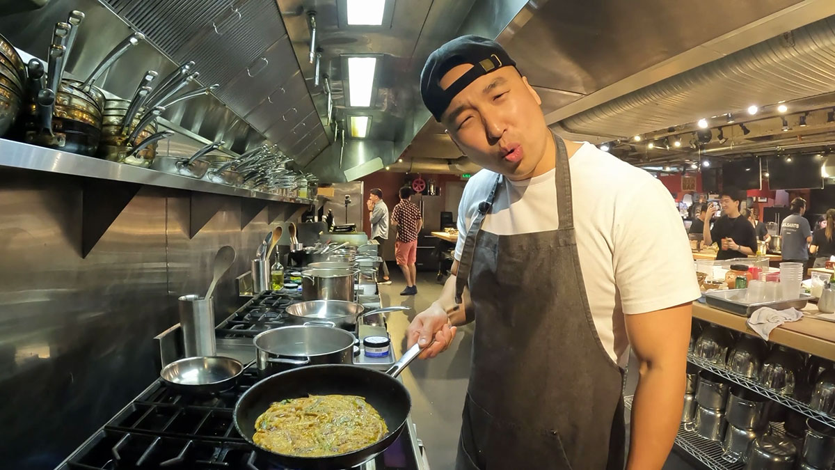 Chef Chris Cho making kimchi pancake 
