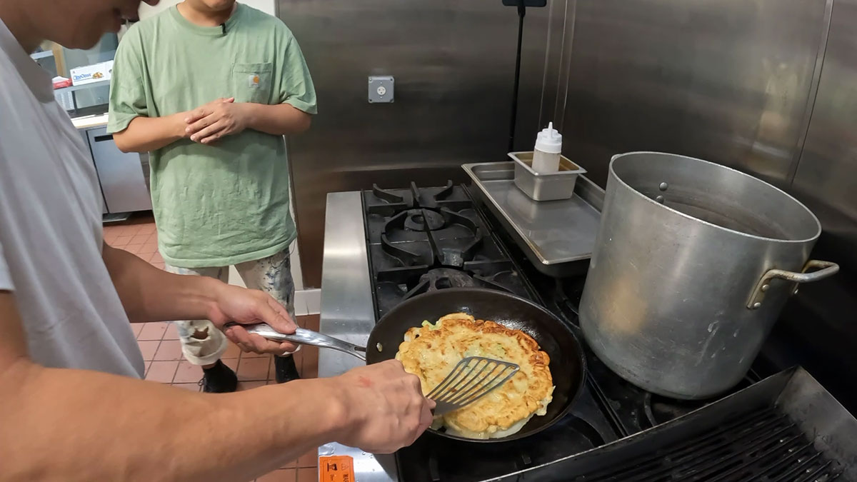 Cook seafood pancake until golden brown