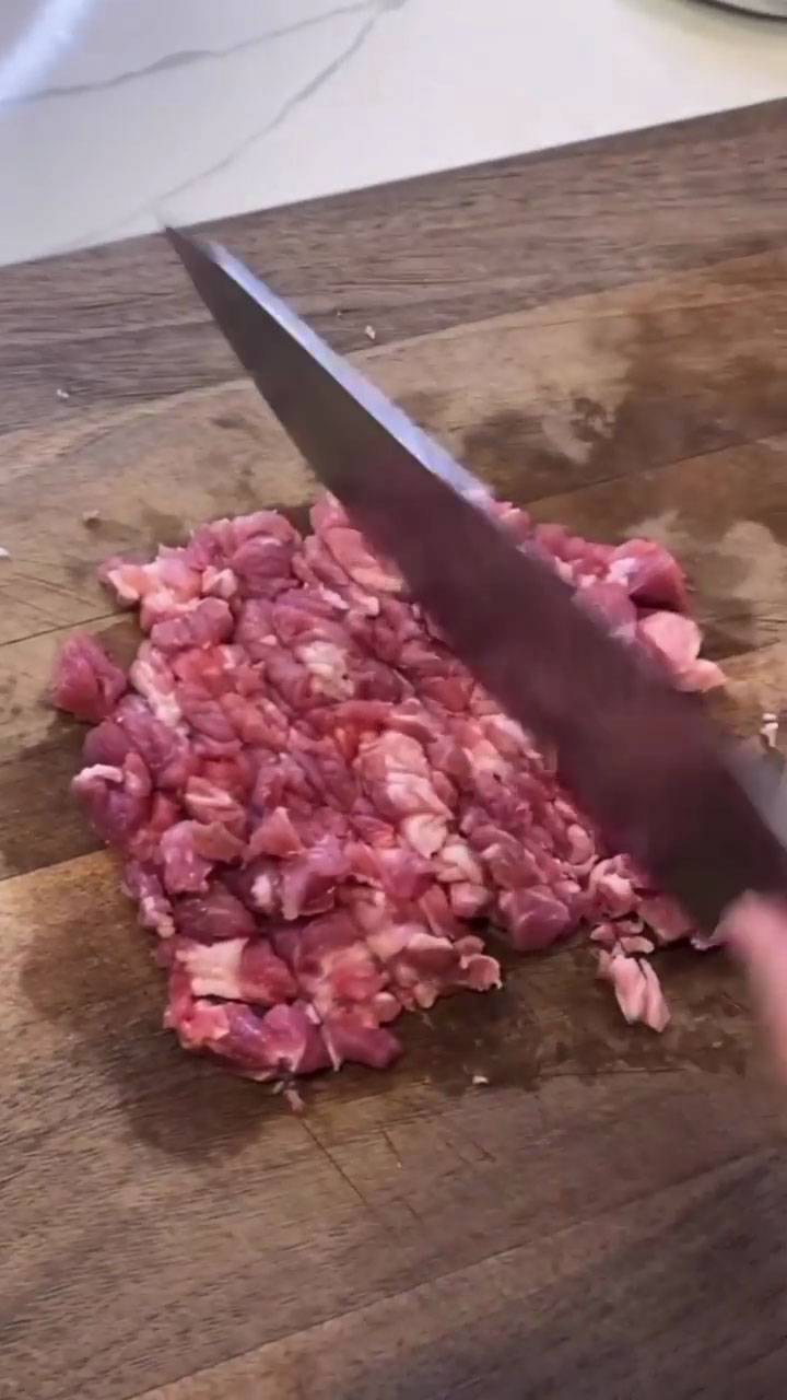 Chopping the pork 