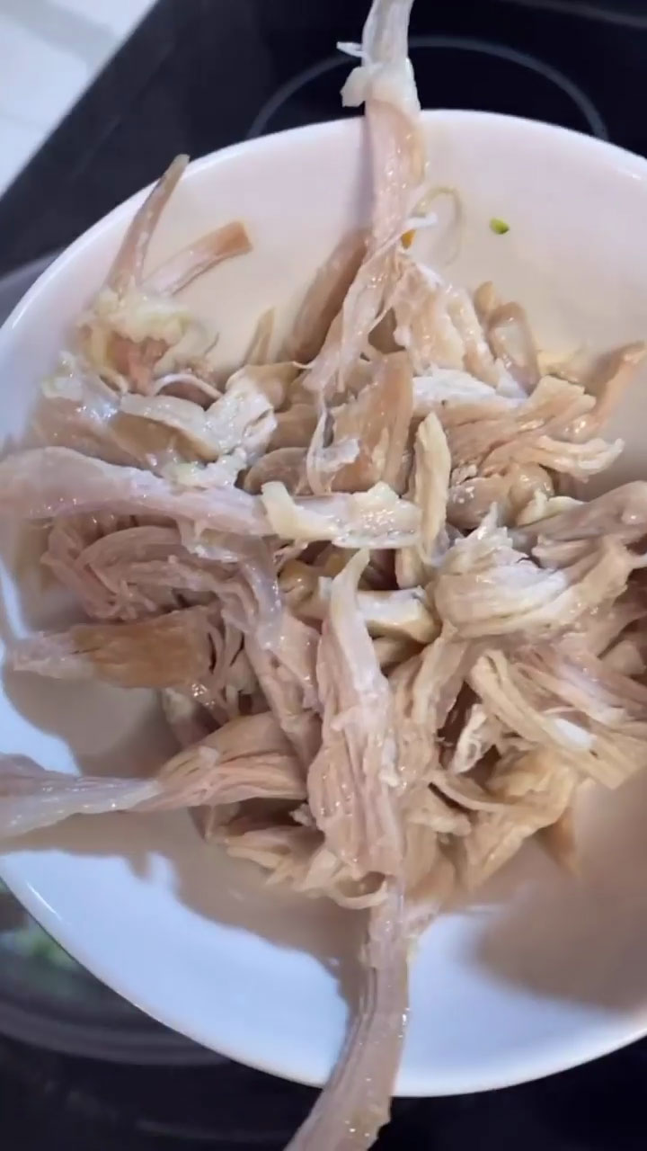 Shred the boiled chicken