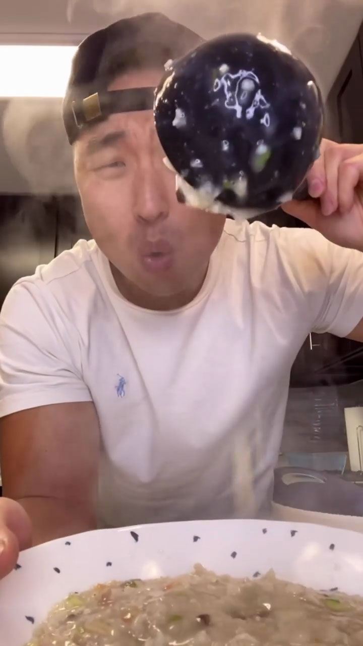 Chef Chris Cho making Korean chicken porridge