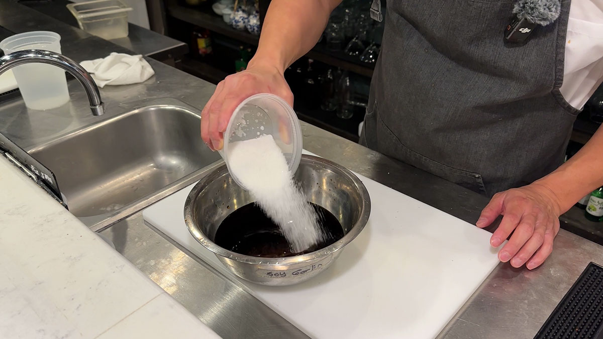 Combine soy sauce, water, and sugar