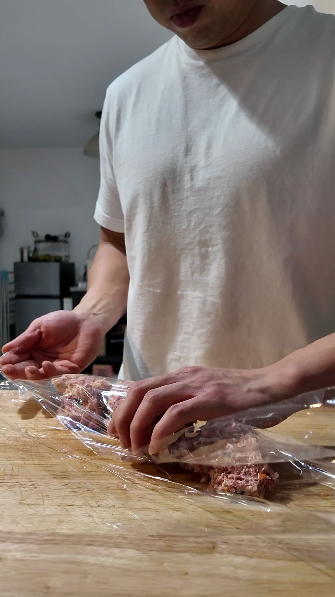 Place patty mixture on a plastic wrap 