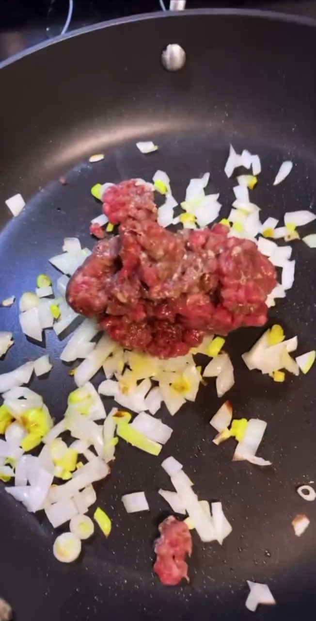 Saute the seasoned ground beef 