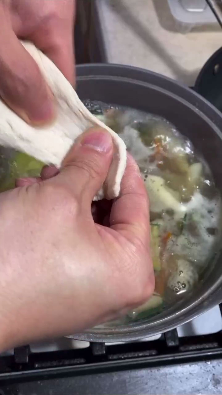 Tear the sujebi dough and place in soup right away 