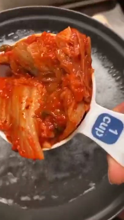 Add kimchi to the boiling water