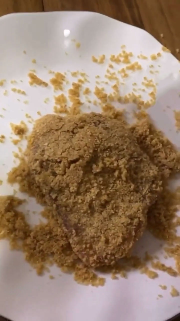 Coat the pork cutlet with almond flour, egg, and pork rind