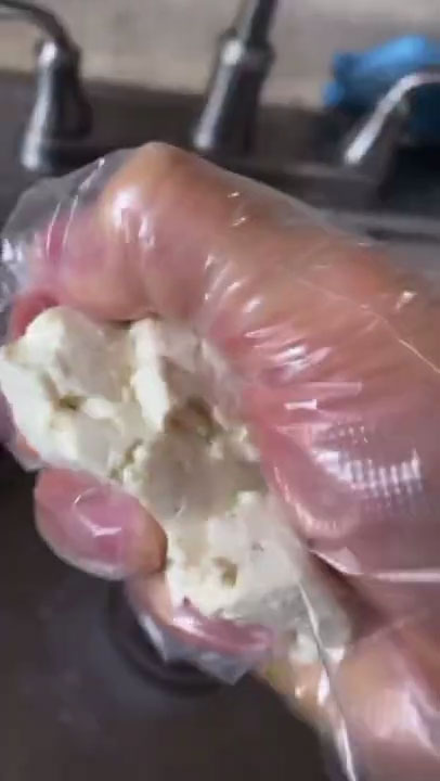 Squeeze the remaining water from the tofu