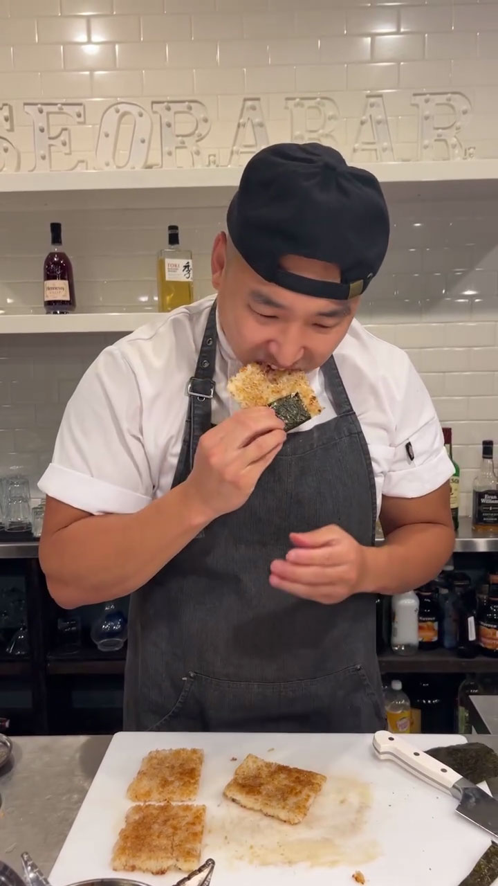 Chef Chris Cho enjoying the crispy rice