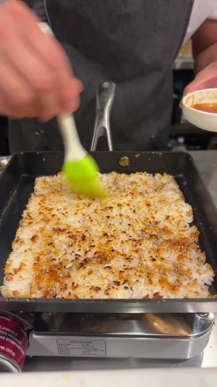 Brush the glaze into the crispy rice 