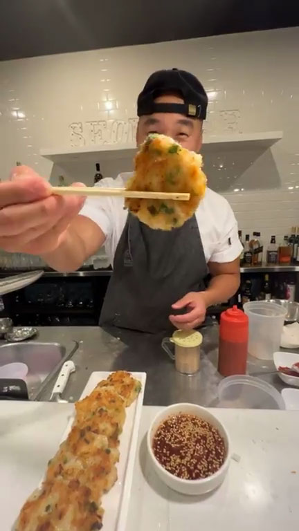 Chef Chris Cho making shrimp pancake 