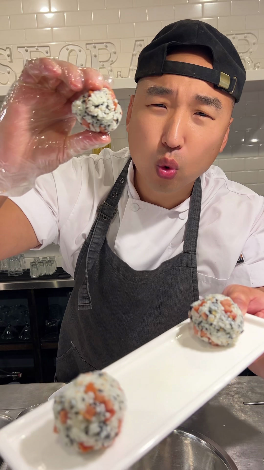 Chef Chris Cho making Jumeok Bap 