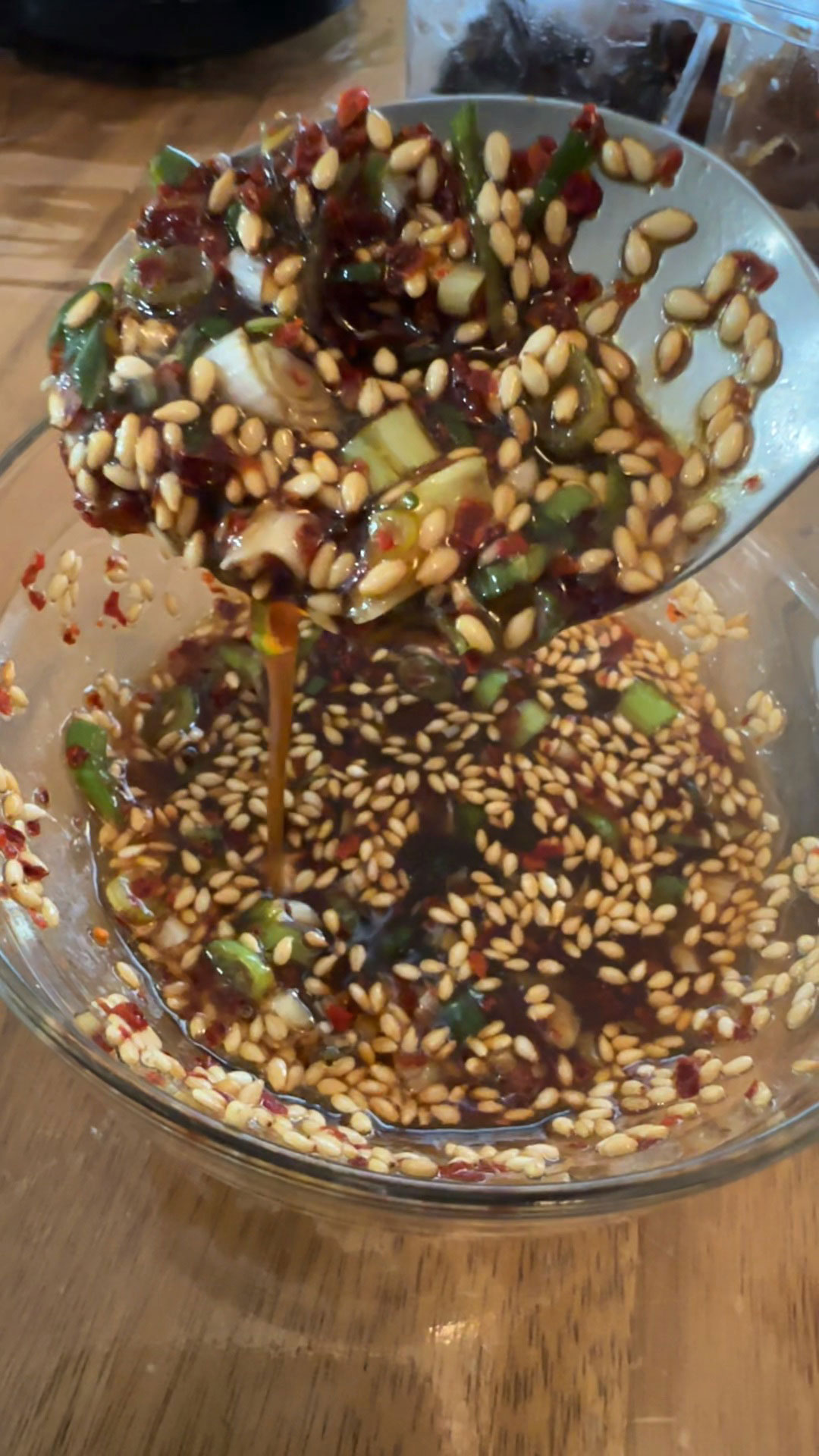 Combine soy sauce, vinegar, plum sauce, sesame oil, sesame seeds, gochugaru, and scallions