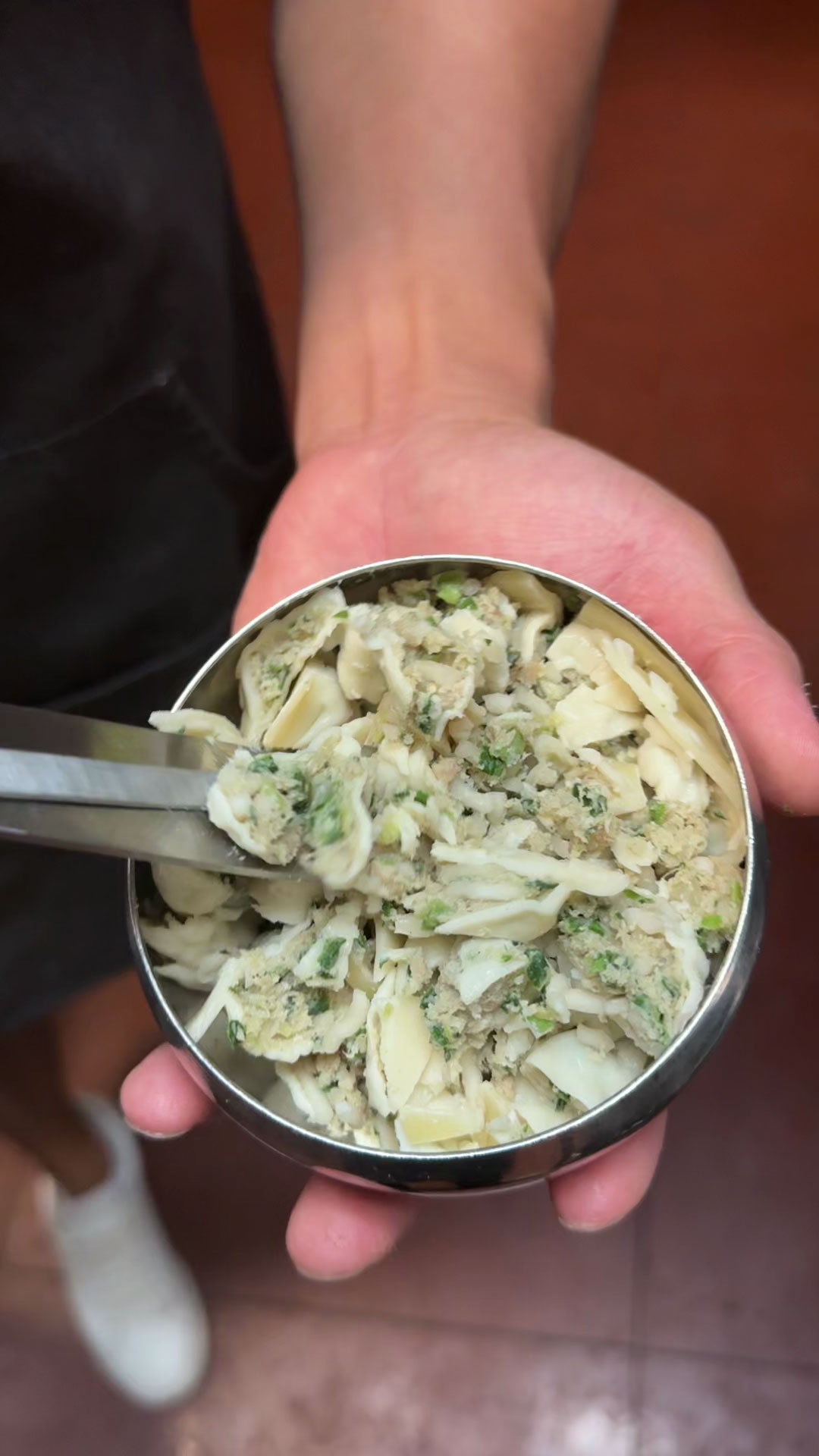 Mince the dumplings using a pair of scissors