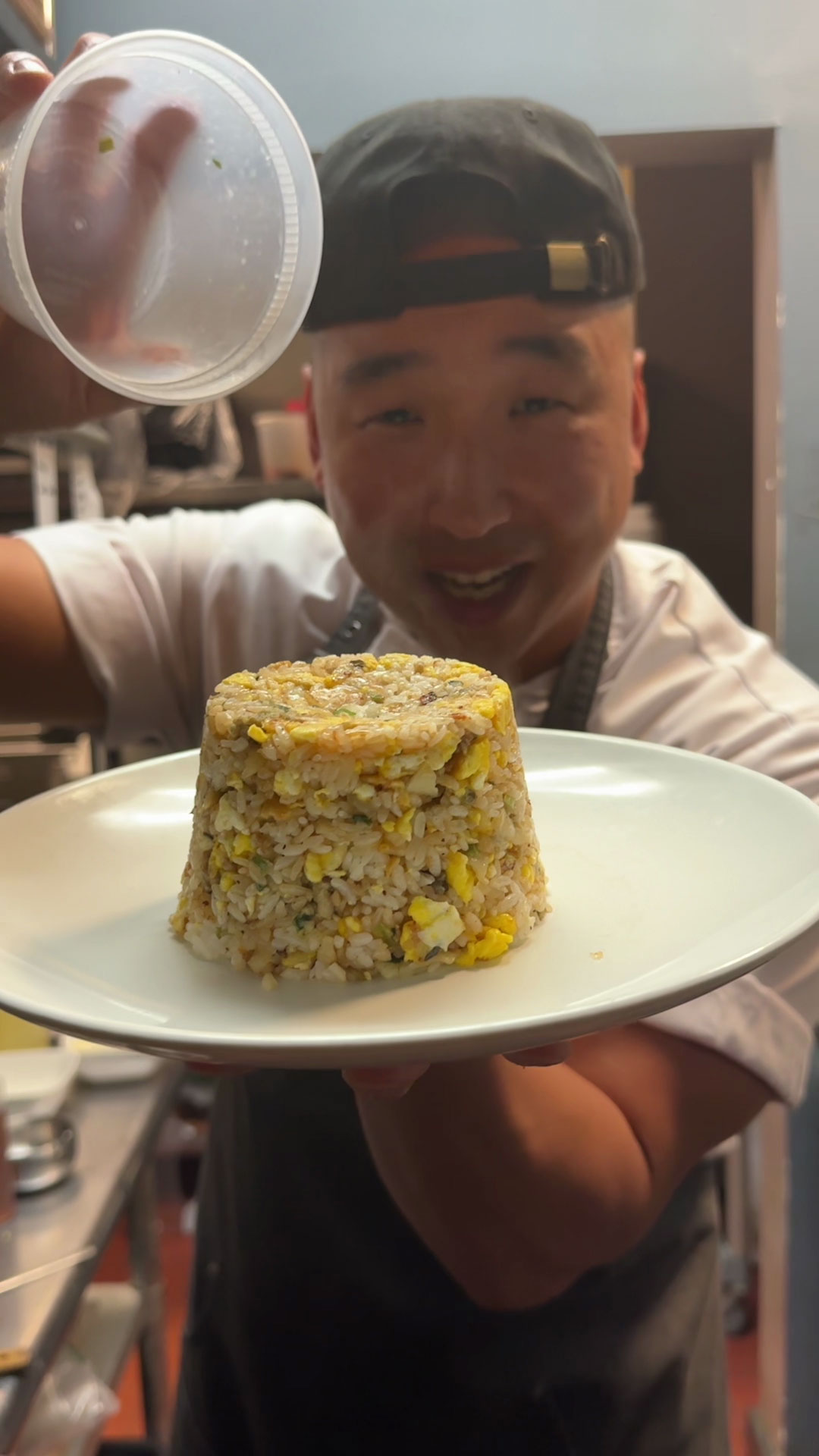 Chef Chris Cho making dumpling fried rice 