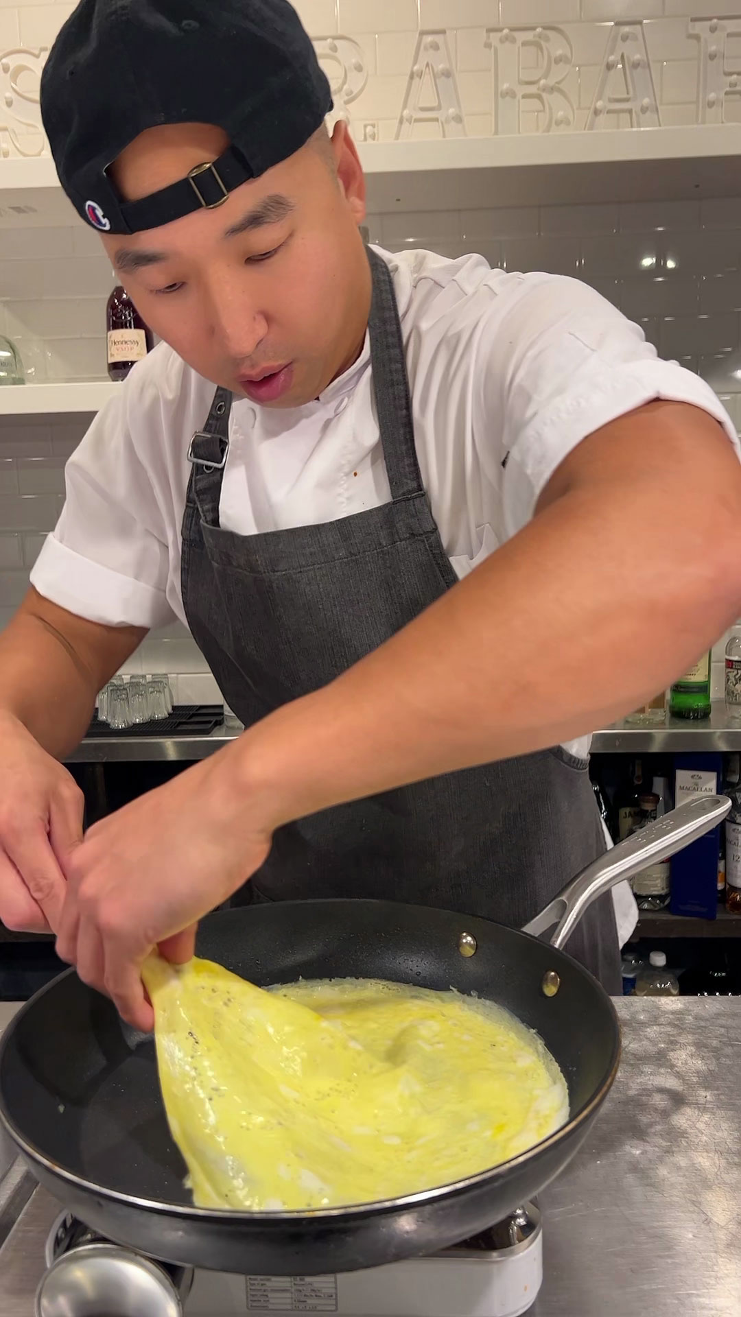 Use a spatula and your hands to flip the sheet of egg 