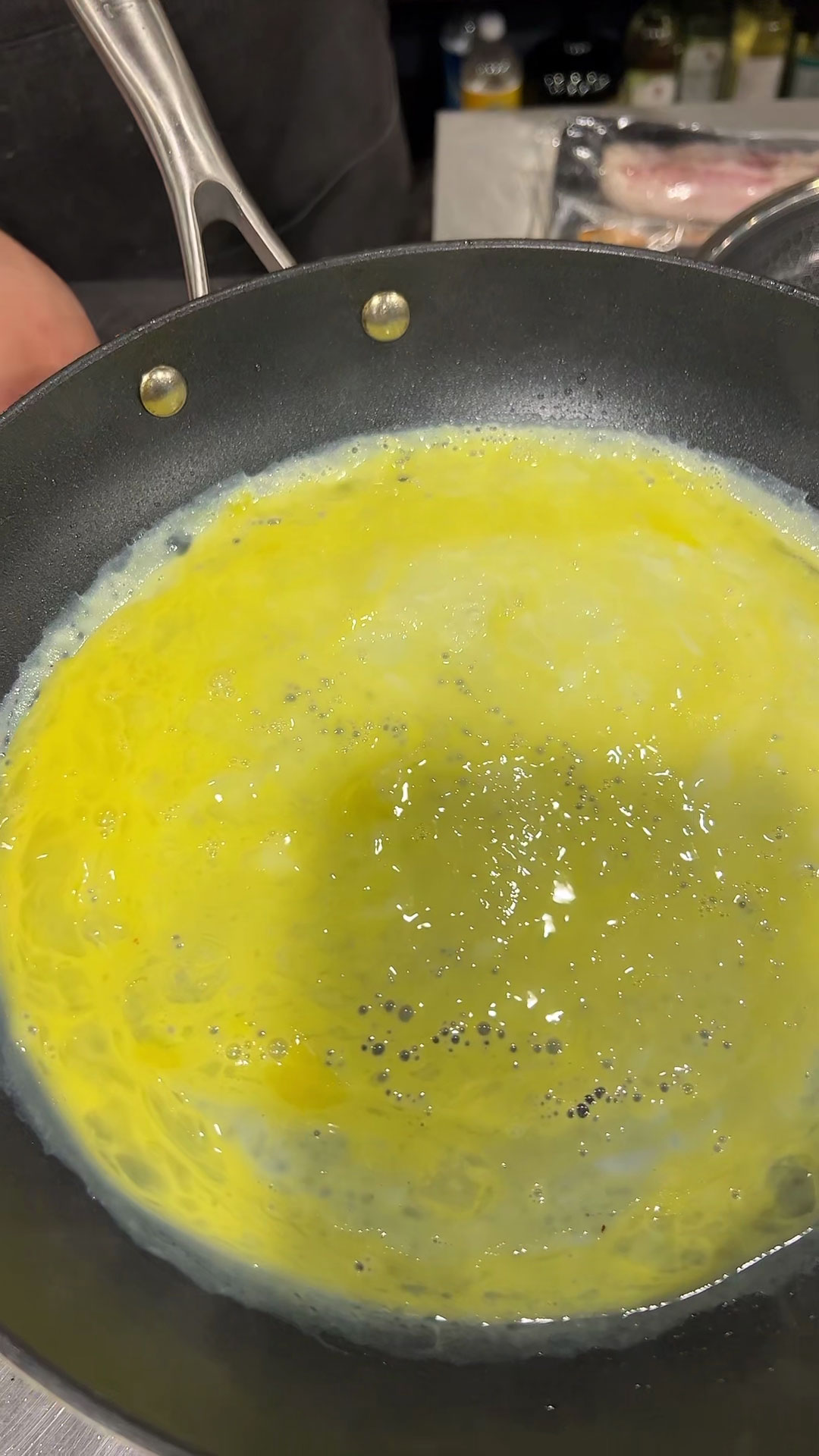 Spread the scrambled egg to the edges of the pan