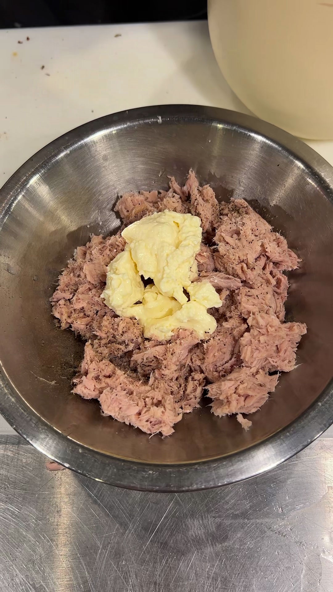 Combine drained tuna, mayo, salt, and pepper