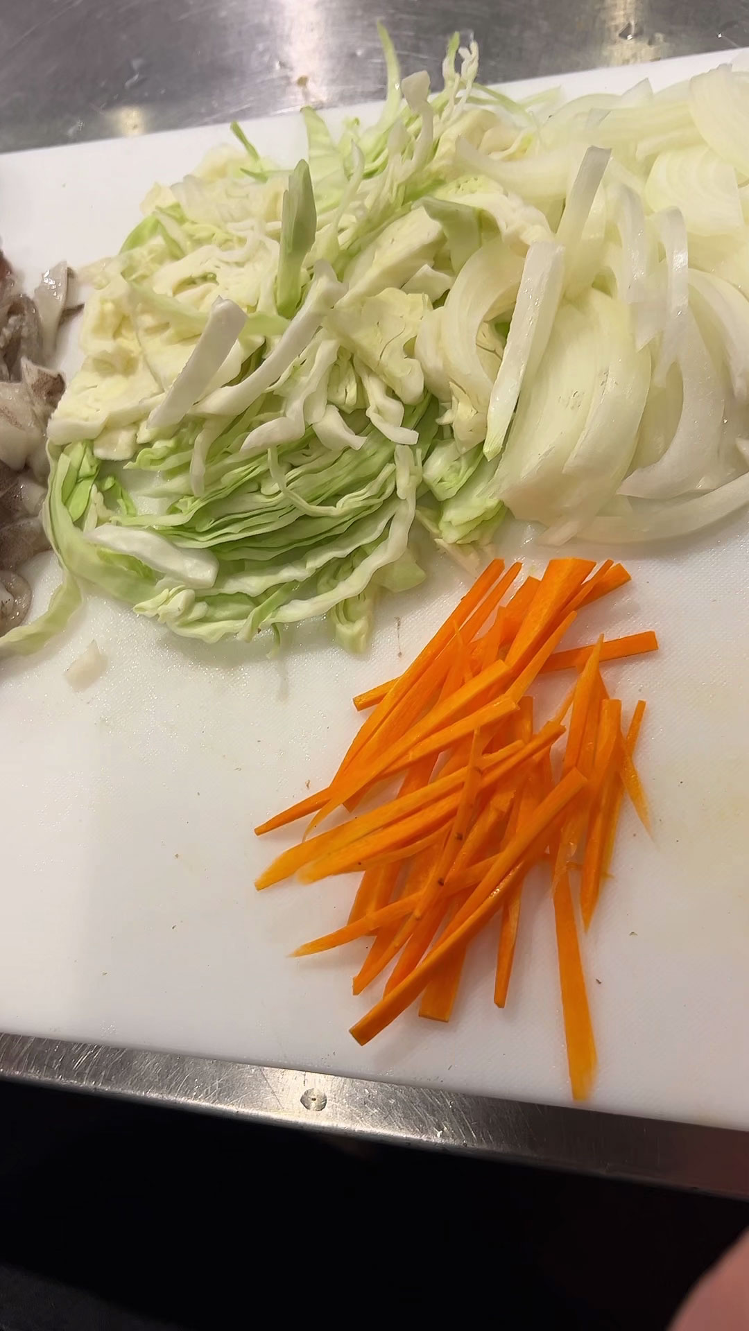 Chopped vegetables: Cabbage, Onion, and Carrots