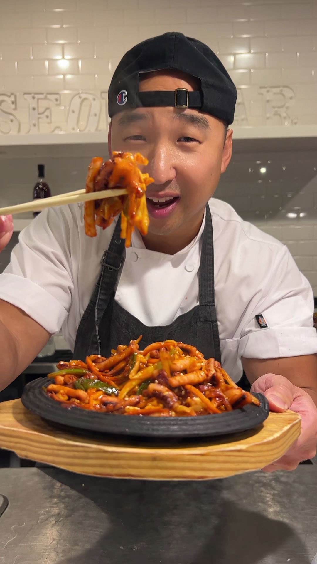 Chef Chris Cho making spicy stir fried squid 